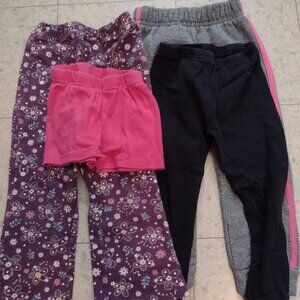 Three pairs of long pants and one pair of pretty pink shorts, size 2T and 3T